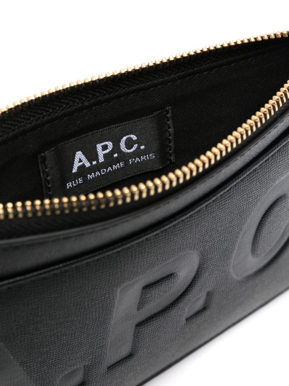 Shop Apc Logo-debossed Faux-leather Clutch Bag In 黑色