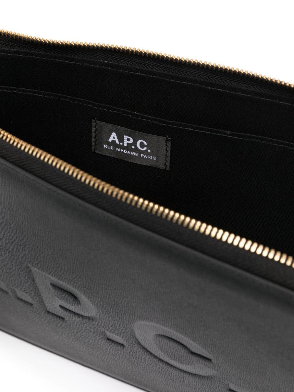 Shop Apc Logo-debossed Leather Clutch Bag In Schwarz