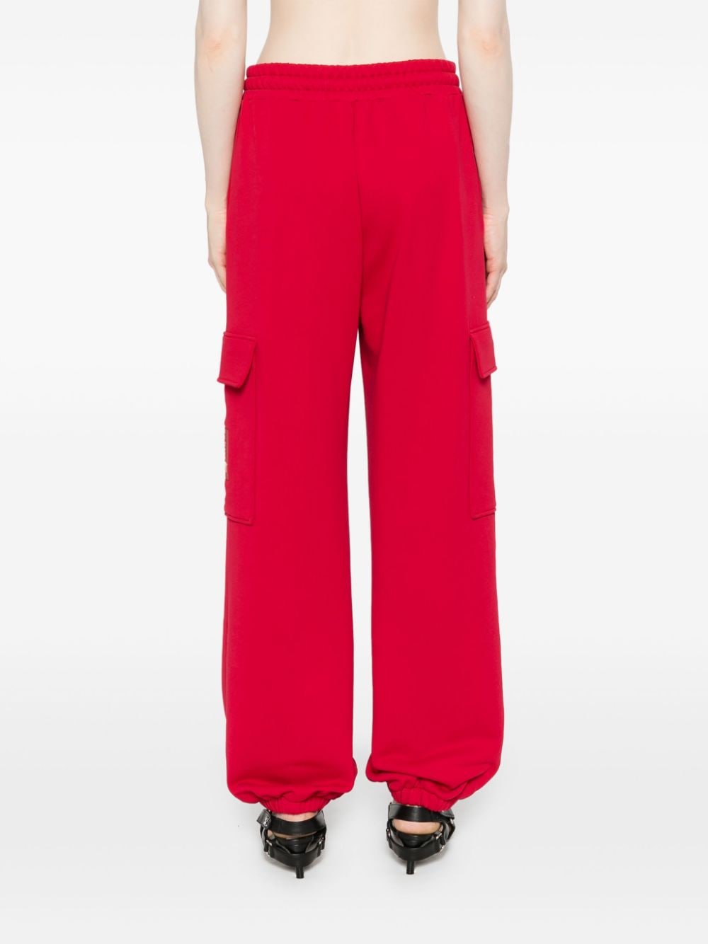 Shop Moschino Logo-patch Track Pants In Red