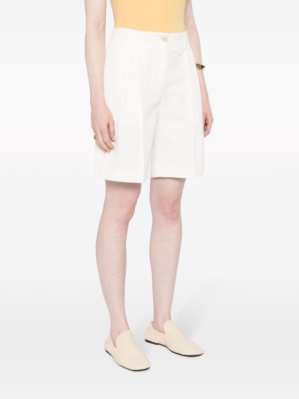 Shop Totême Twill Pleated Shorts In White