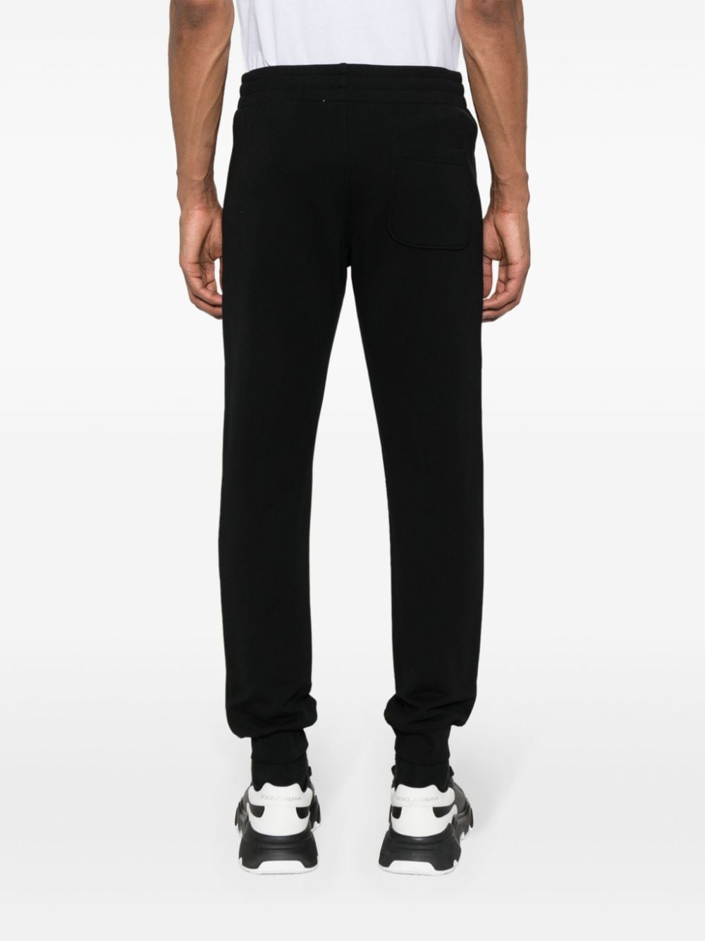 Shop Moschino Logo-lettering Cotton Track Pants In Black