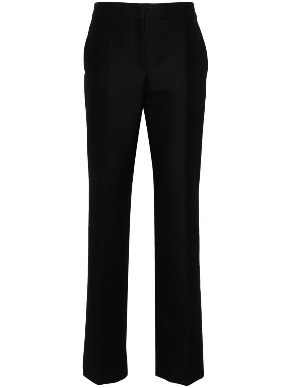 Shop Moschino Patch-detail Trousers In Black