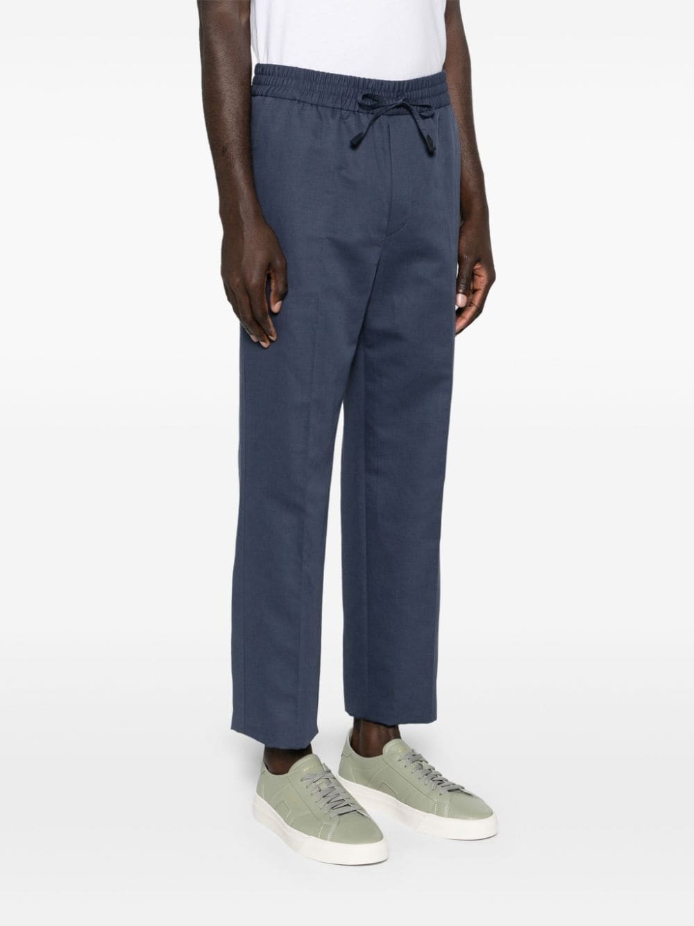 Shop Brioni Mid-rise Tapered Trousers In Blue