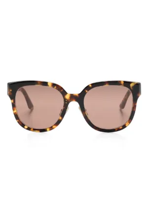 Miu Miu Eyewear tortoiseshell-effect cat-eye Sunglasses | Green