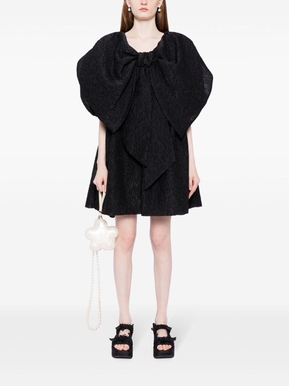 Simone Rocha Gesmockte jurk met oversized strik Zwart