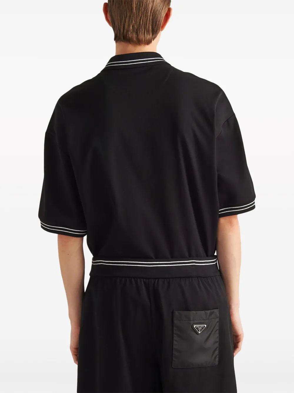Prada Re-Nylon piqué poloshirt Zwart