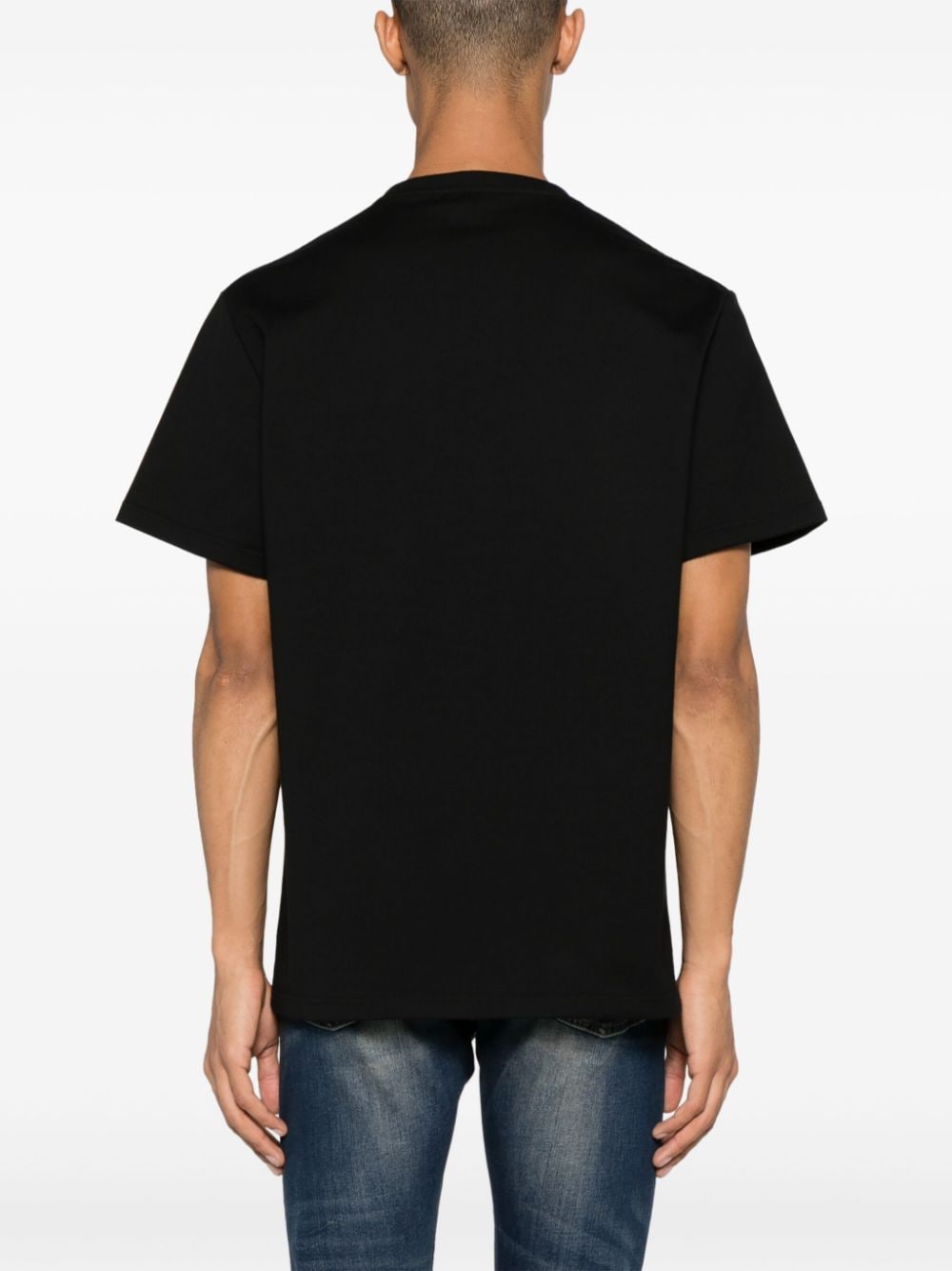 Shop Alexander Mcqueen Reflected Logo-print Cotton T-shirt In Schwarz