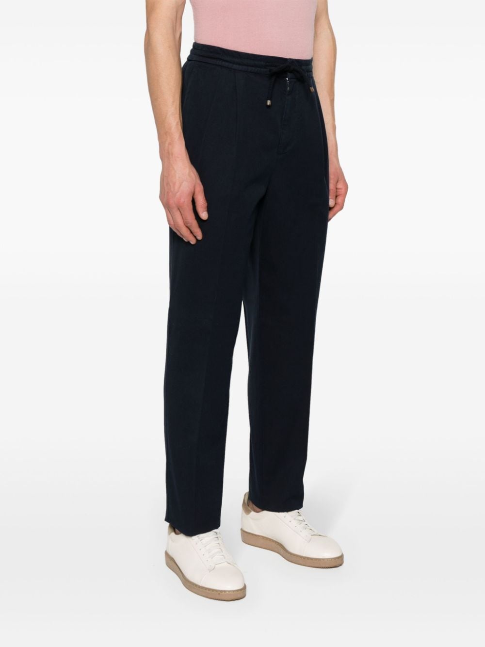 Shop Brunello Cucinelli Pressed-crease Loose-fit Trousers In Blue