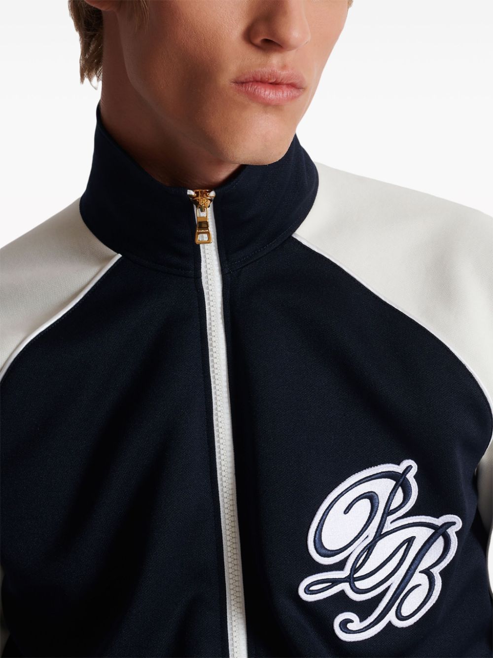 Balmain logo-applique varsity jacket Men