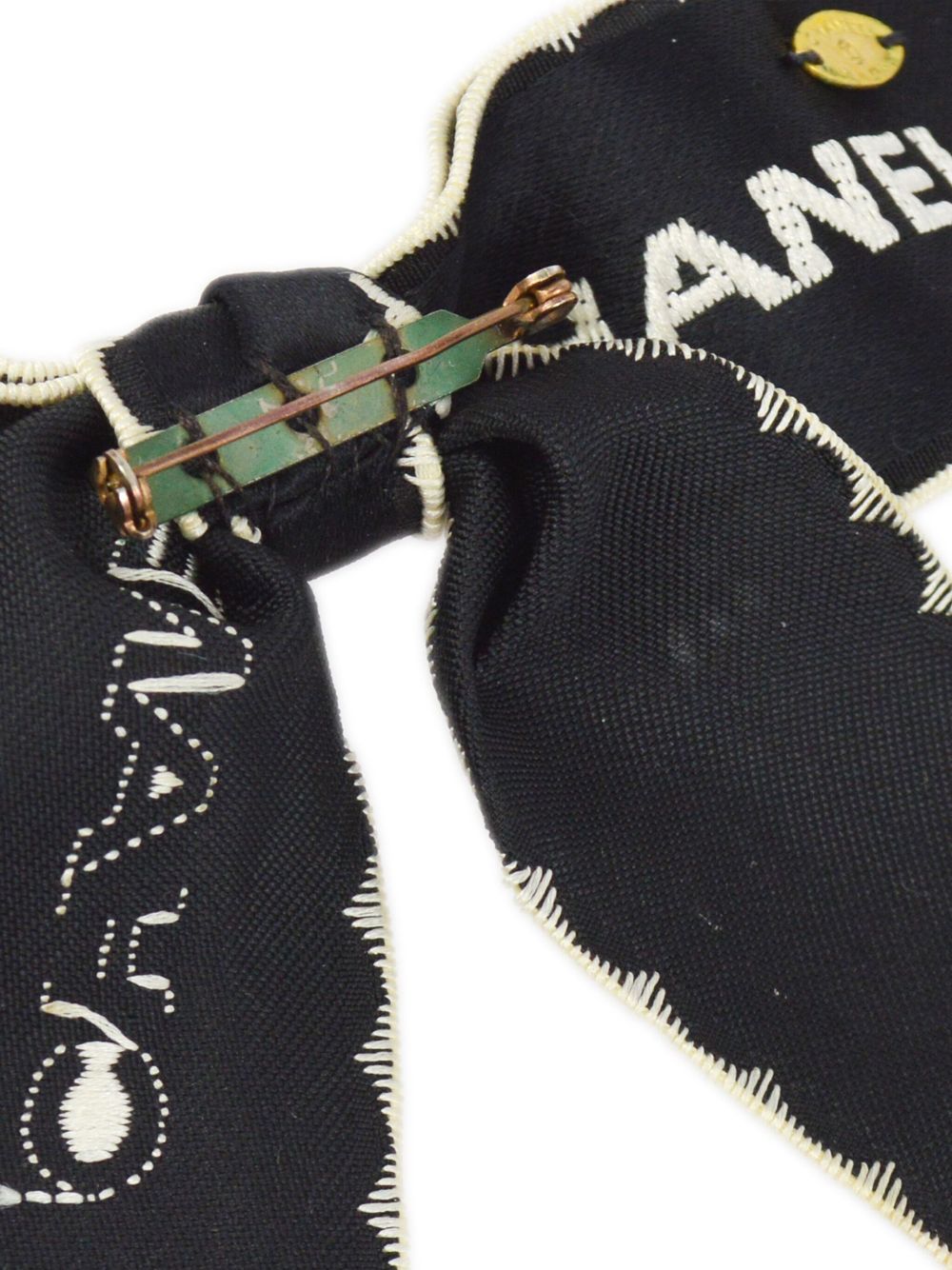 CHANEL 1990-2000 logo-embroidered ribbon pin Women