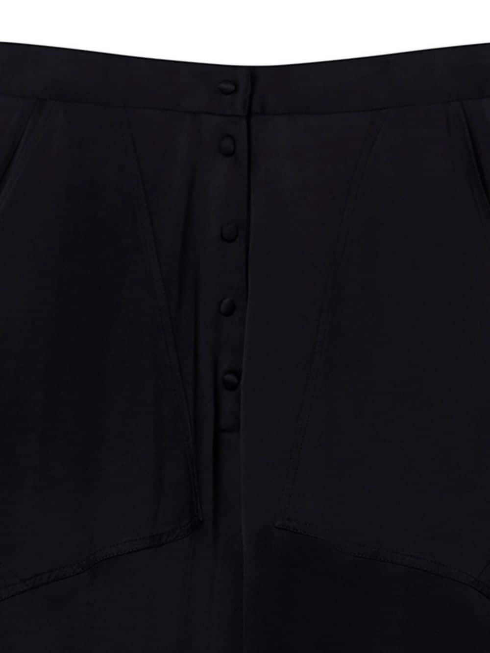 Shop Stella Mccartney Panelled Satin Tapered Trousers In 黑色