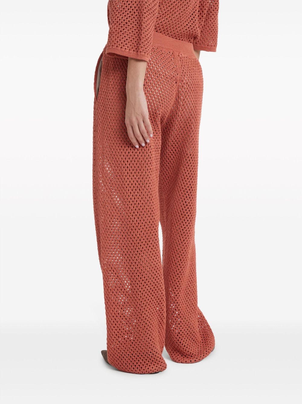 Shop Brunello Cucinelli Net-stitch Knitted Trousers In Orange