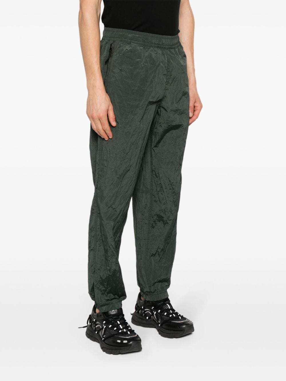 Shop Stone Island Compass-badge Shell Tapered Pants In Green