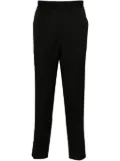 Golden Goose logo-plaque virgin wool trousers - Black