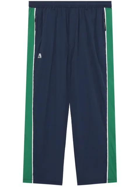 izzue pants con rayas laterales