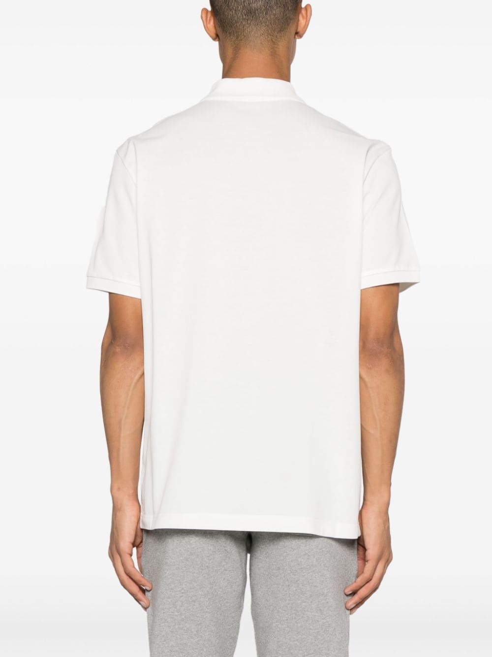 Shop Moncler Logo-appliqué Polo Shirt In White