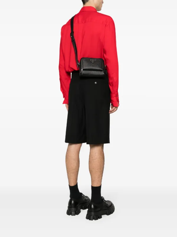 Prada enamel-logo Messenger Bag | Black | FARFETCH