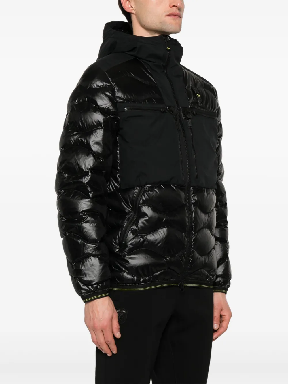 Blauer Golvend gewatteerd jack met capuchon Zwart