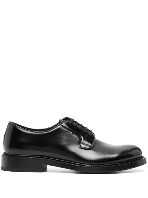 Chaussures bateau à logo embossé - Prada - Modalova