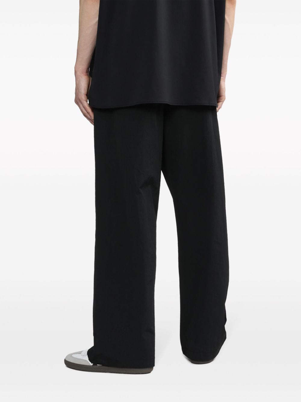 Shop Izzue Adjustable Wide-leg Trousers In Black