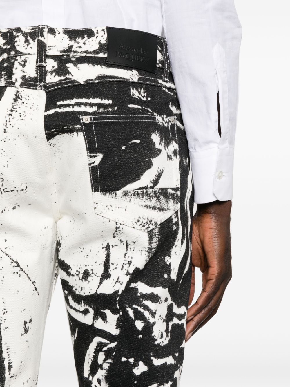 Alexander McQueen Straight jeans met abstracte print Zwart