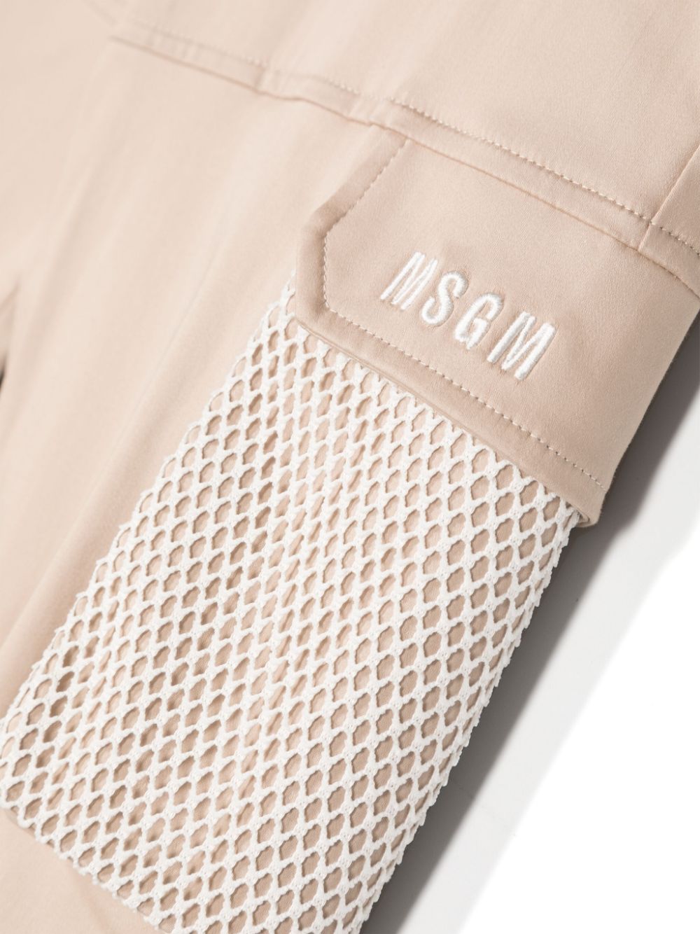 Shop Msgm Embroidered-logo Mesh-panelling Trousers In Neutrals
