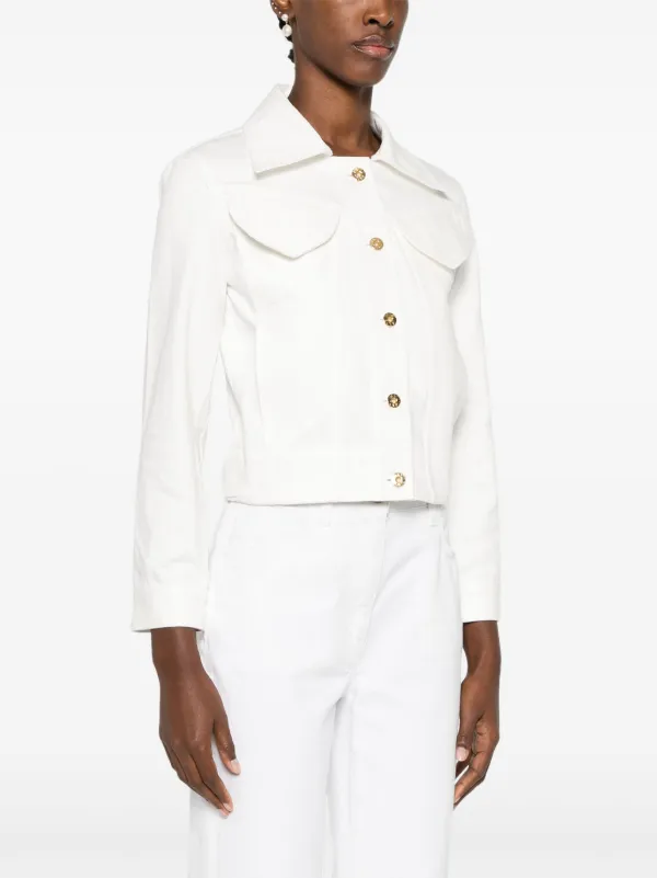 Patou logo-patch Cropped Denim Jacket | White | FARFETCH