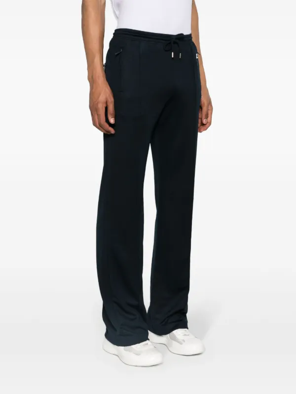 Courrèges logo-patch Interlock Track Pants | Blue | FARFETCH