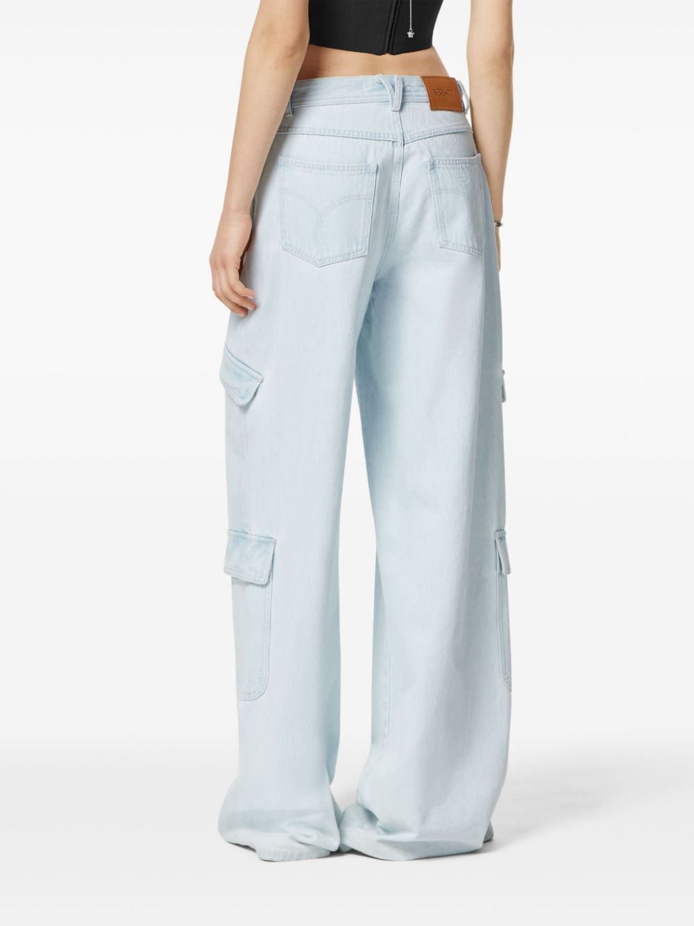 Shop Versace Wide-leg Cargo Jeans In Blue