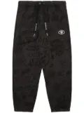 AAPE BY *A BATHING APE® graffiti-print track pants - Brown