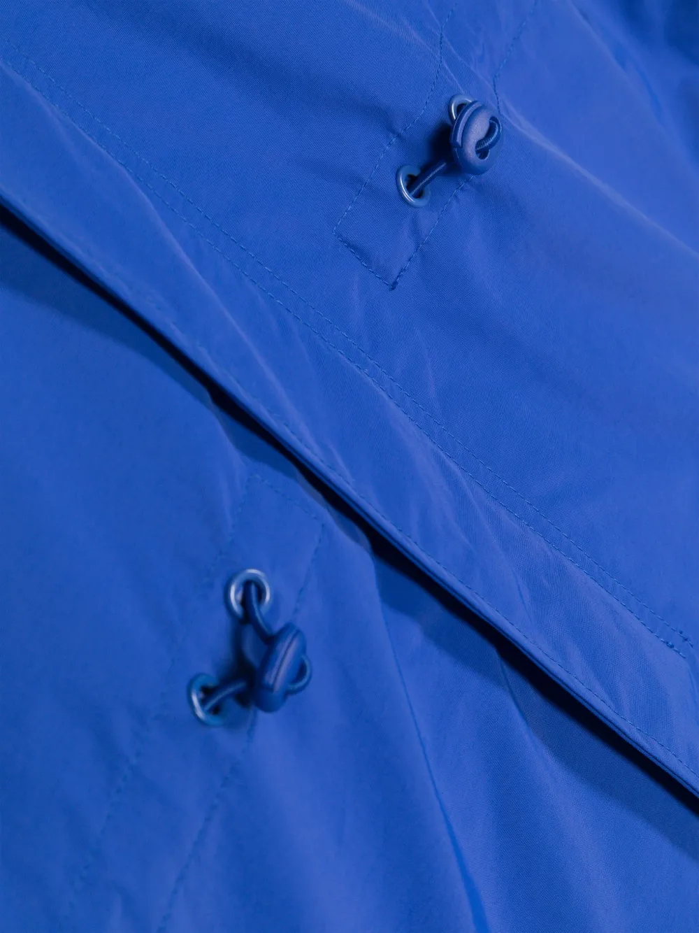 Bobo Choses Regenjas met capuchon en logoband Blauw