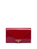 Prada triangle-logo patent leather clutch bag - Red