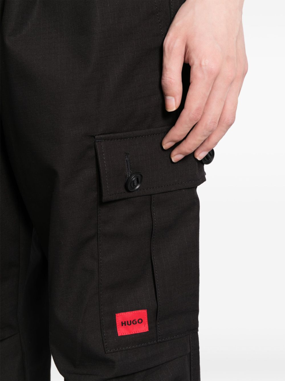 Shop Hugo Logo-appliqué Cargo Trousers In 黑色