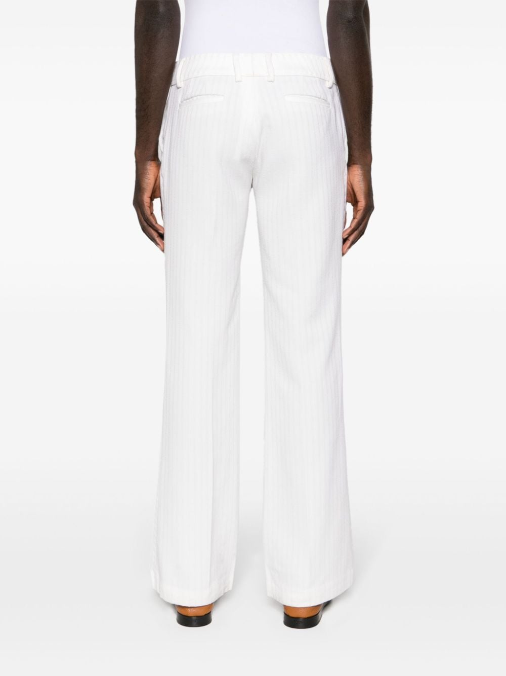 Shop Roberto Cavalli Flared Virgin Wool Trousers In White