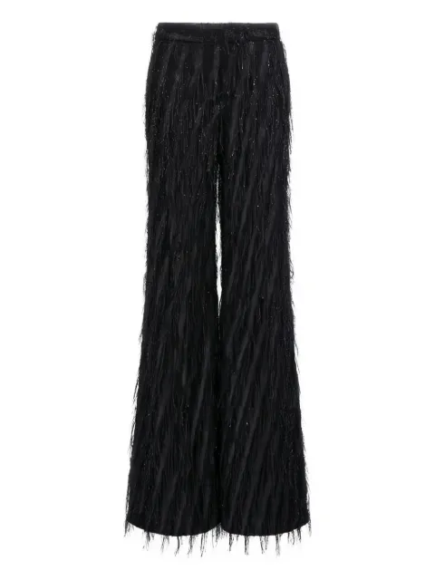 Roberto Cavalli pantalones metalizados con flecos