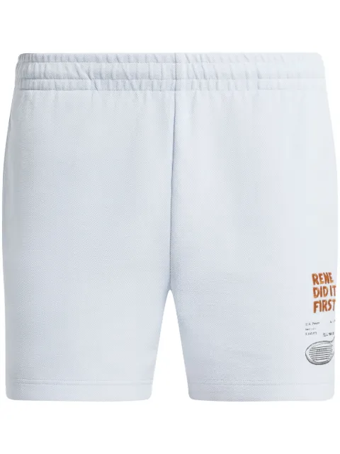 Lacoste shorts con eslogan bordado