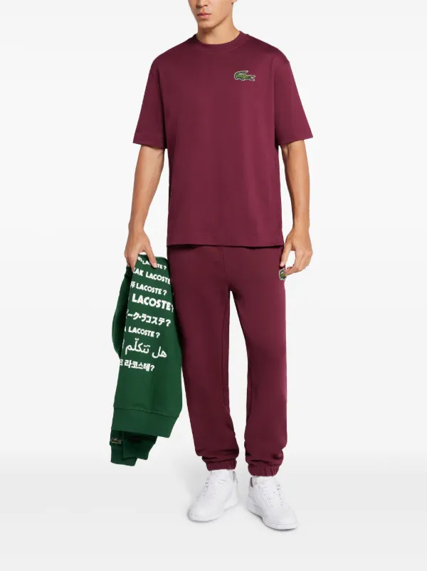 Lacoste ロゴパッチ トラックパンツ | レッド | FARFETCH JP
