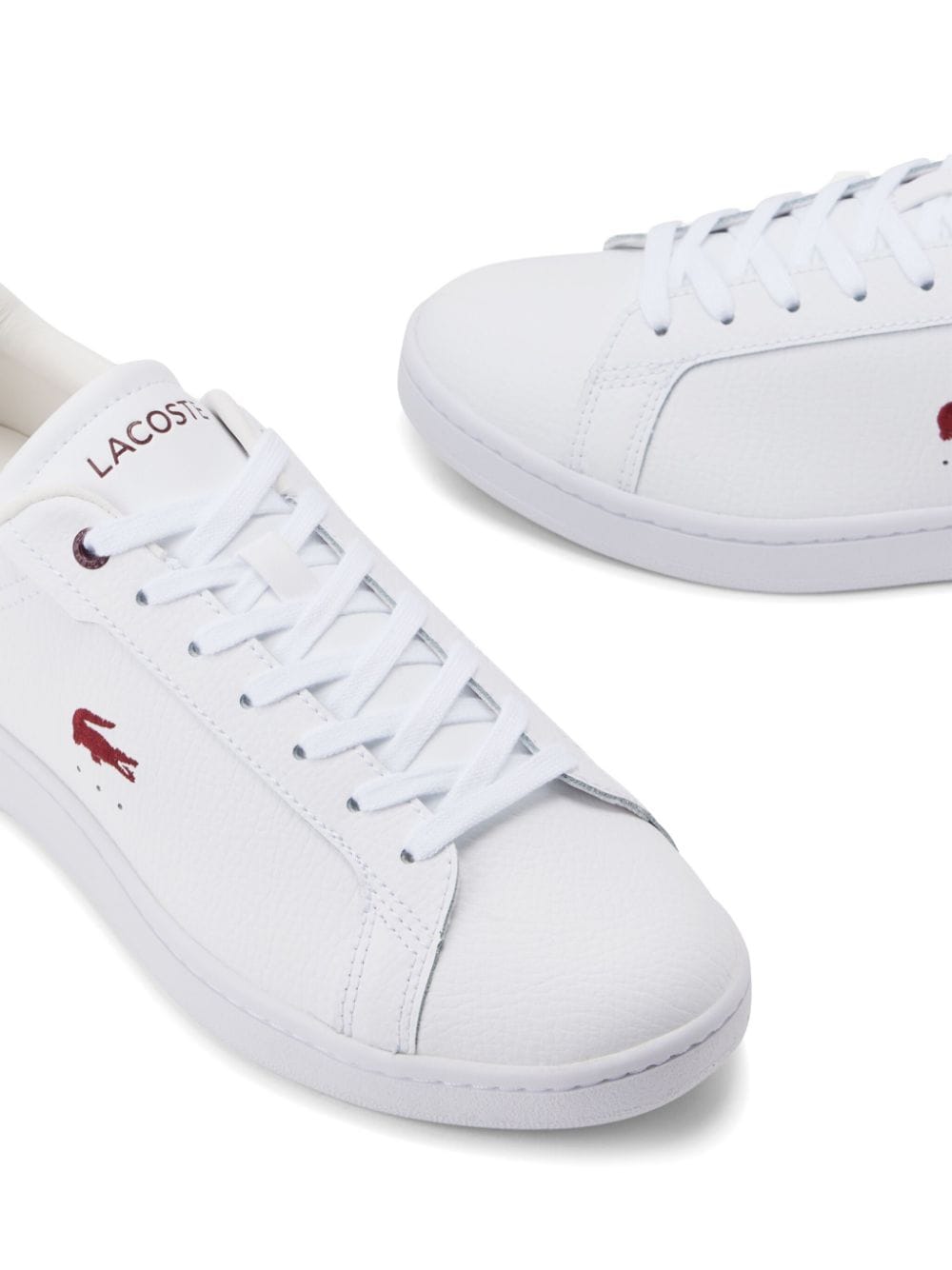 Shop Lacoste Carnaby Pro Leather Sneakers In White