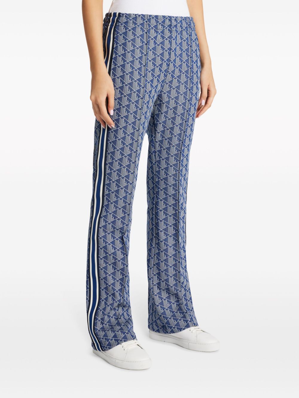 Shop Lacoste Monogram-pattern Track Pants In Blue