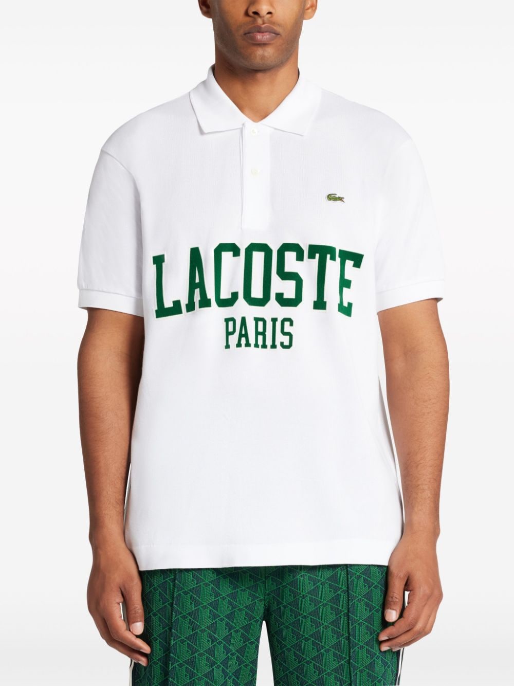 Shop Lacoste Logo-appliqué Polo Shirt In White