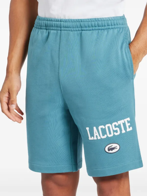 【LACOSTE】club 裾ロゴ プリント コットン ハーフパンツ ♪ Lacoste オーガニックコットン ショートパンツ | ブルー
