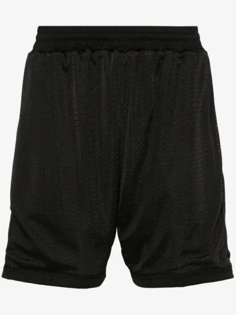 Represent shorts con perforaciones