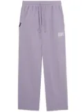 izzue logo-embroidery cotton track pants - Purple