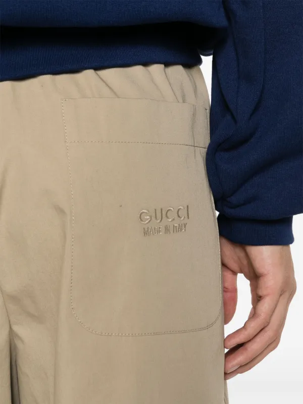 Gucci トラックパンツ | ニュートラル | FARFETCH JP