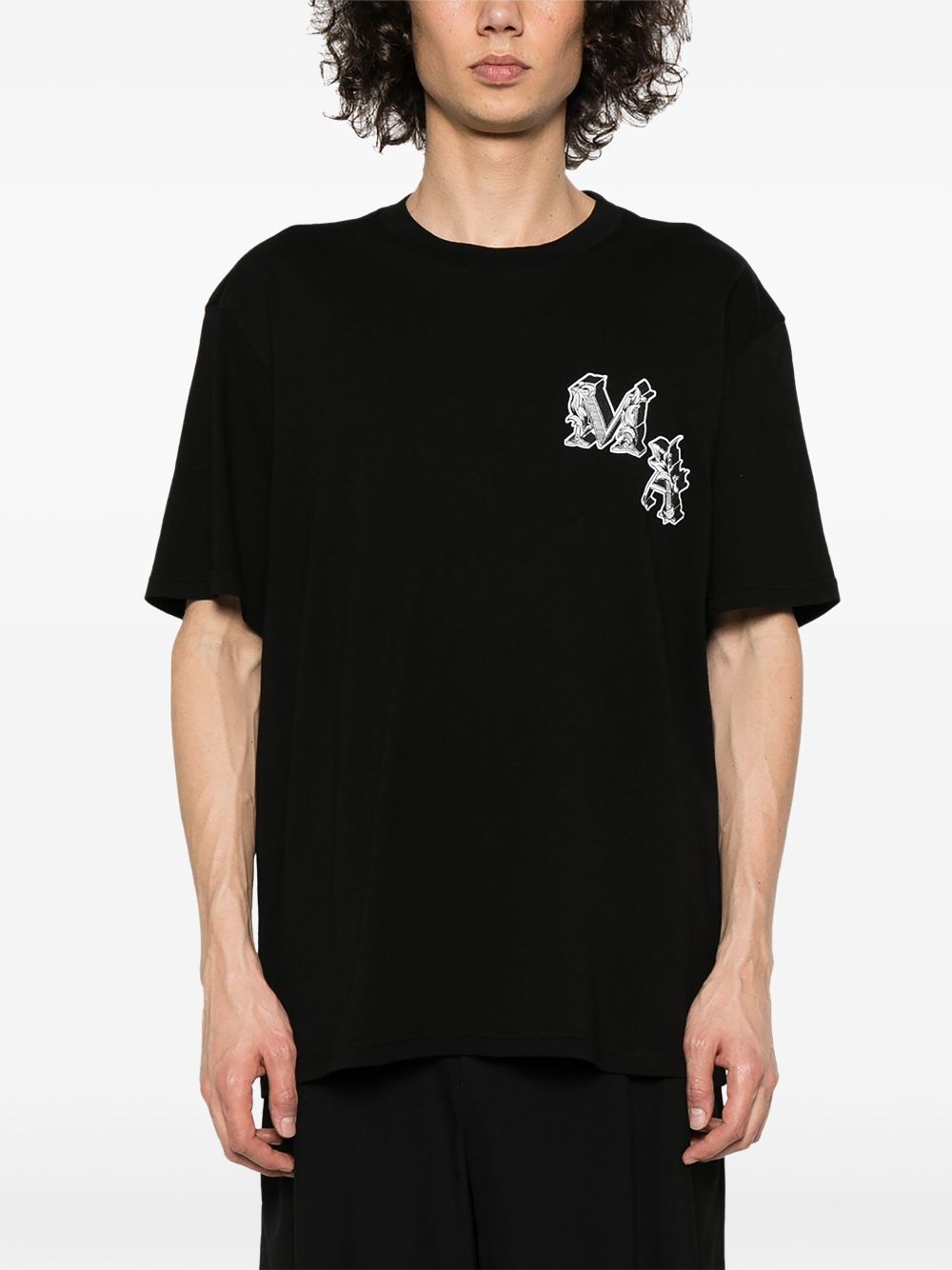 Shop Amiri Logo-print Cotton T-shirt In Black