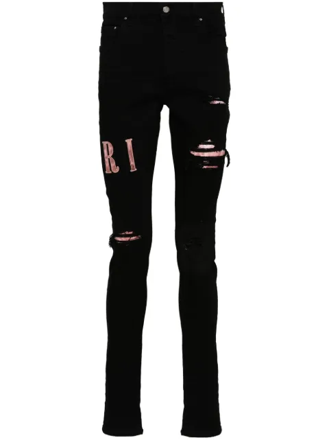 AMIRI skinny jeans con apliques del logo