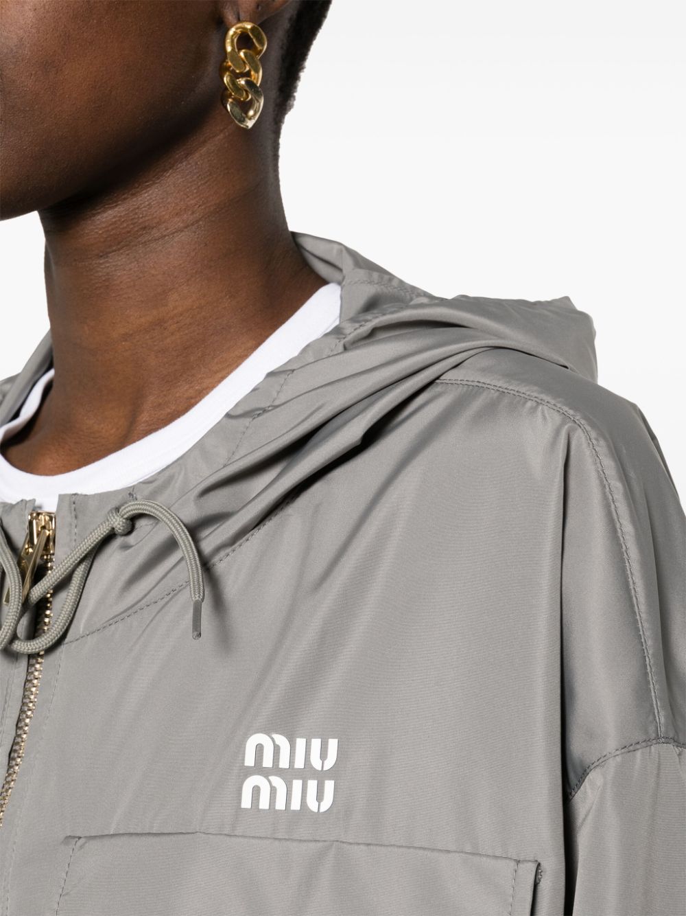 Shop Miu Miu Logo-appliqué Water-repellent Jacket In Grey