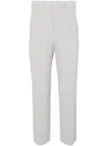 Homme Plissé Issey Miyake Basic tapered plissé trousers - Grey