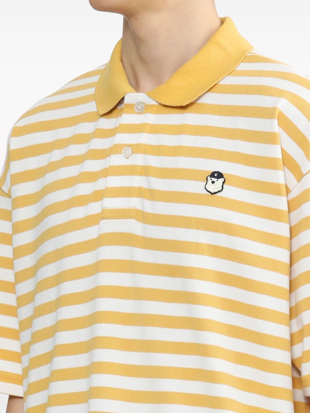 Shop Chocoolate Striped Cotton Polo Shirt In Yellow