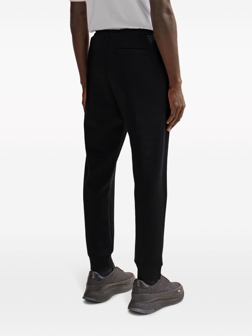 Shop Hugo Boss Logo-print Tapered Track Pants In Black